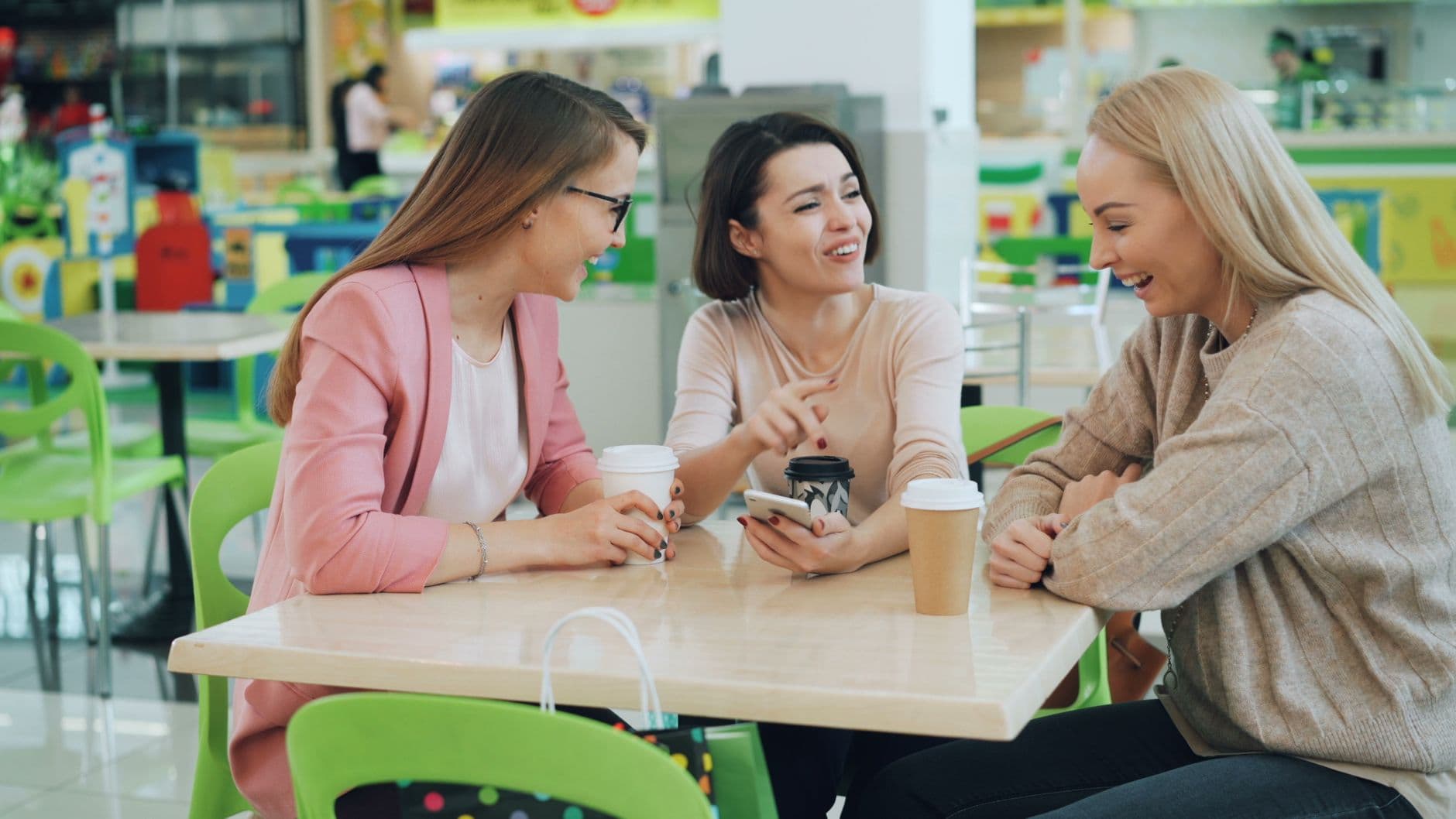 A group of friends comparing notes over coffee